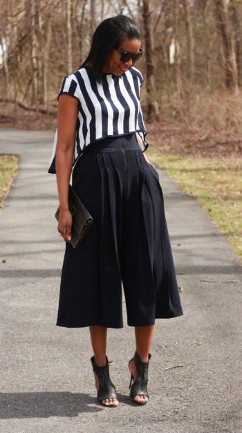 Rocking this cute culottes, stripes, bag and pumps is another stylish way